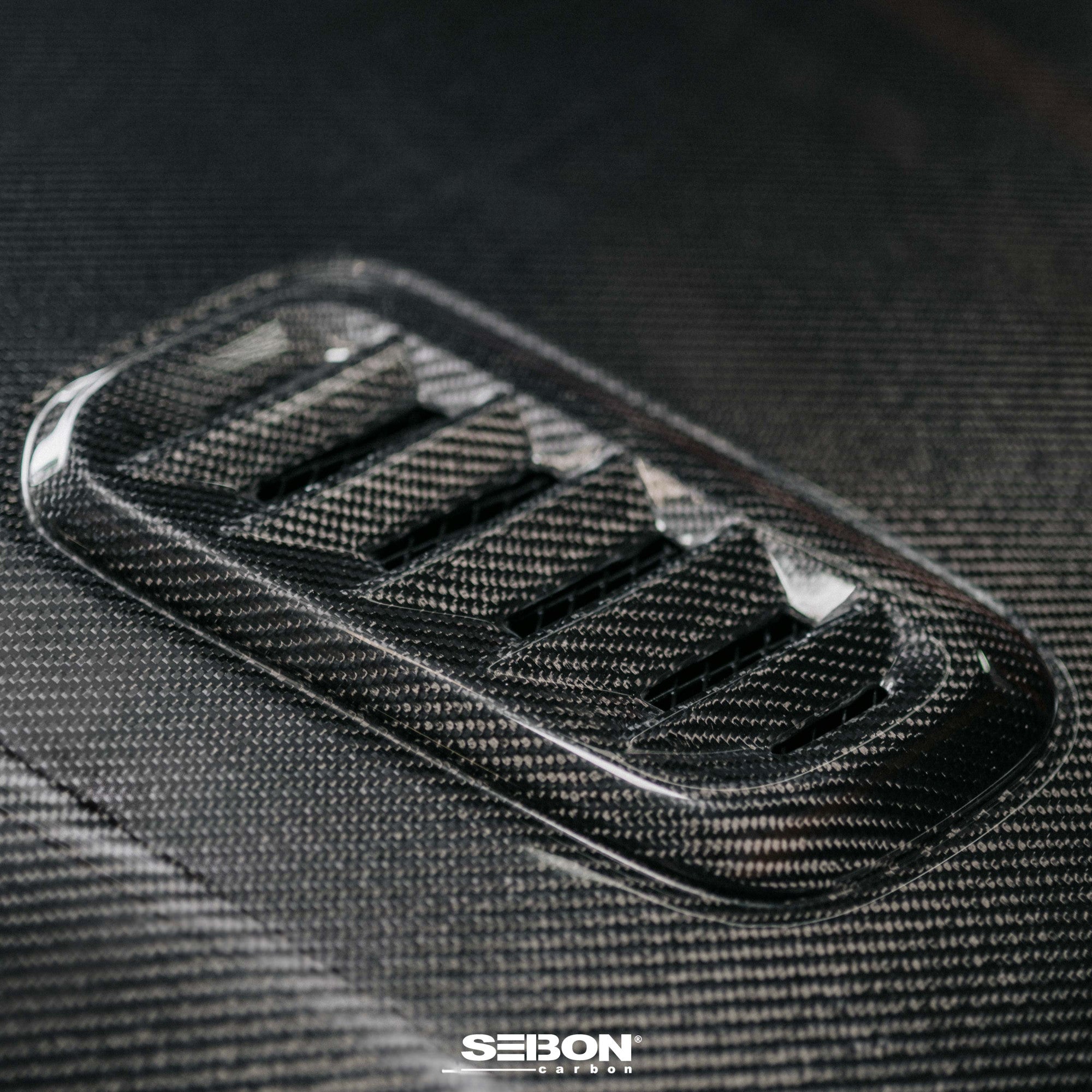 Seibon 2023+ Toyota GR Corolla OE-Style Carbon Fiber Hood - Gloss Finish (HD23TYGRCOR-OE)
