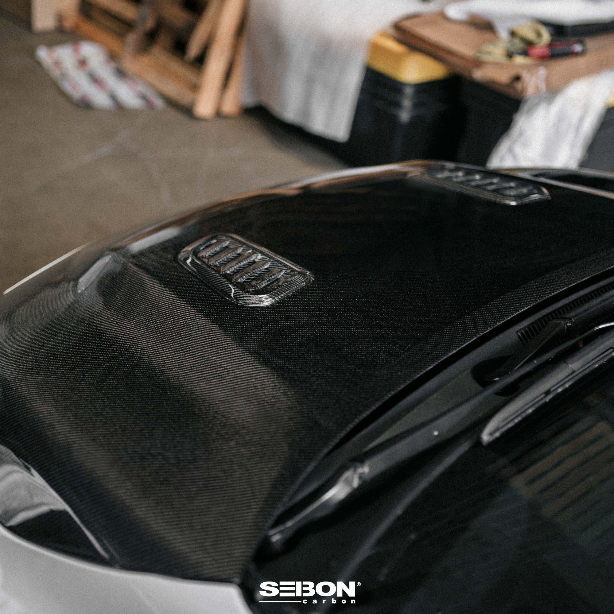 Seibon 2023+ Toyota GR Corolla OE-Style Carbon Fiber Hood - Gloss Finish (HD23TYGRCOR-OE)