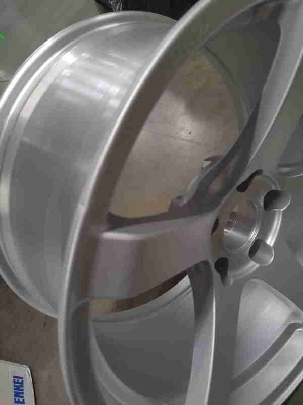 Enkei Kojin 18x9.5 15mm Offset 5x114.3 Bolt Pattern 72.6mm Bore Dia Matte Silver Wheel (539-895-6538GM) — Scratch & Dent
