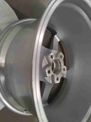 Enkei Kojin 18x9.5 15mm Offset 5x114.3 Bolt Pattern 72.6mm Bore Dia Matte Silver Wheel (539-895-6538GM) — Scratch & Dent