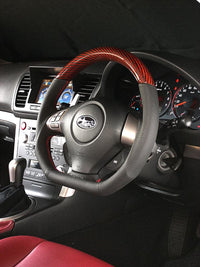 DAMD D-Shape Red Carbon x Red Stitch Steering Wheel - 05-07 WRX/ STi, 04-06 Legacy/ Outback, 03-08 Forester